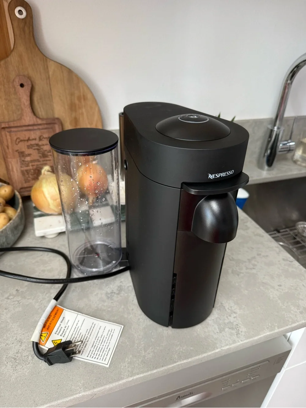 Nespresso VertuoPlus Coffee & Espresso Machine in Black with Gold Capsules